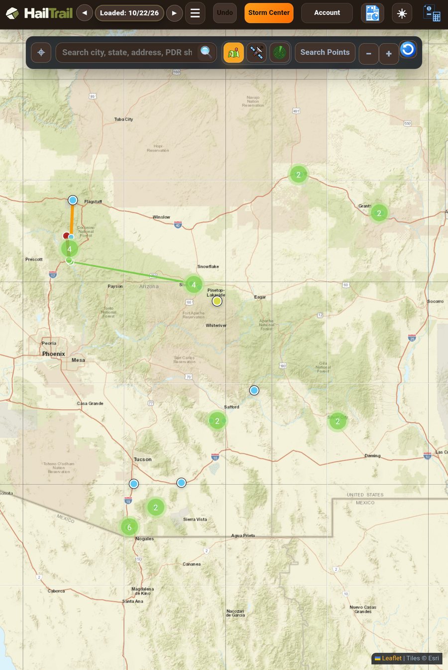 HailTrail on a tablet showing a storm day with hail reports and routes across Arizona